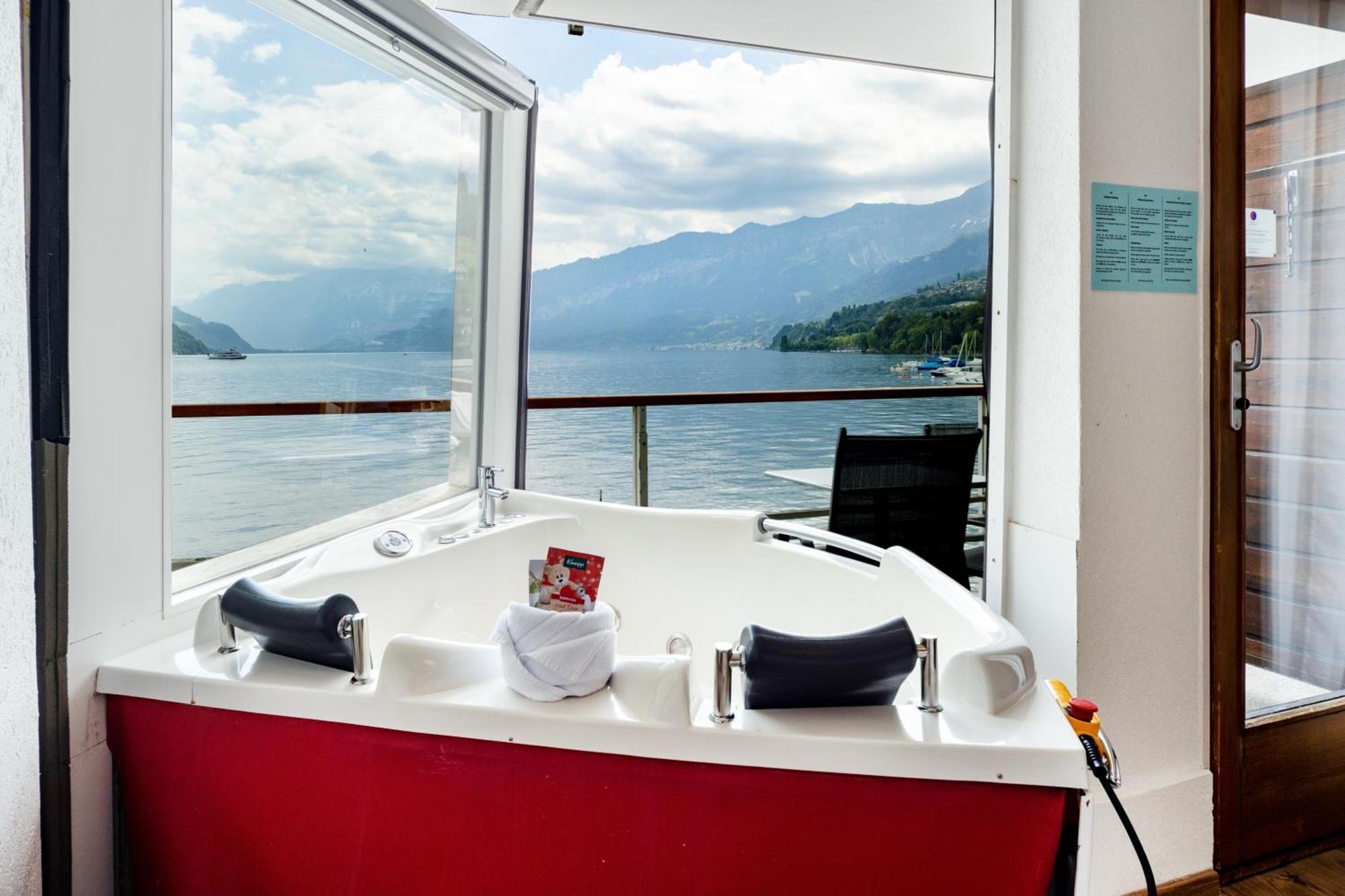 Strandhotel Seeblick Faulensee Exterior foto